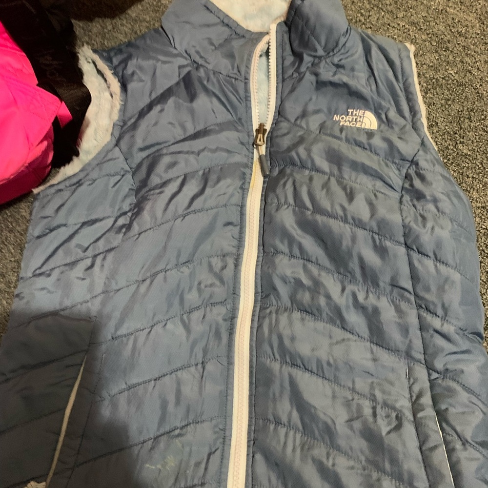 light blue north face vest
